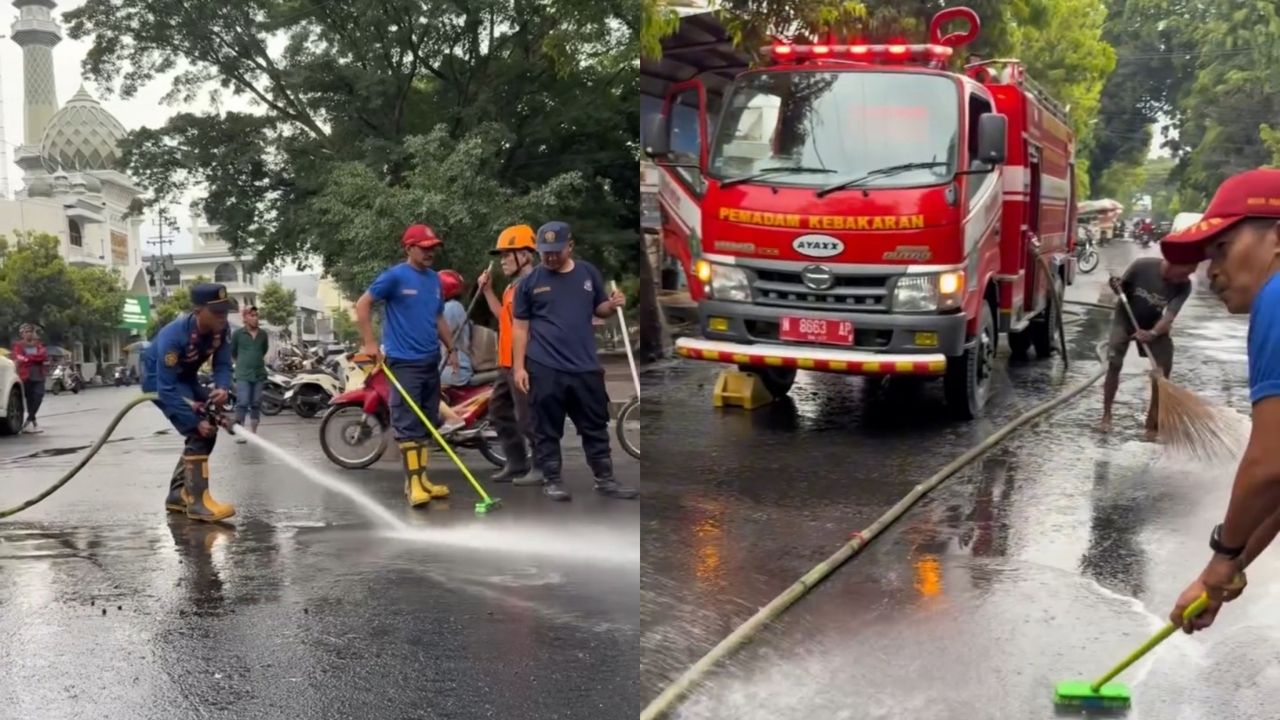 Damkar Kota Malang Bersihkan Tumpahan Oli di Jl. Merdeka Selatan yang Sebabkan Warga Terpeleset (Instagram/@malangfire)