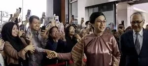 Sri Mulyani Didampingi Suami
